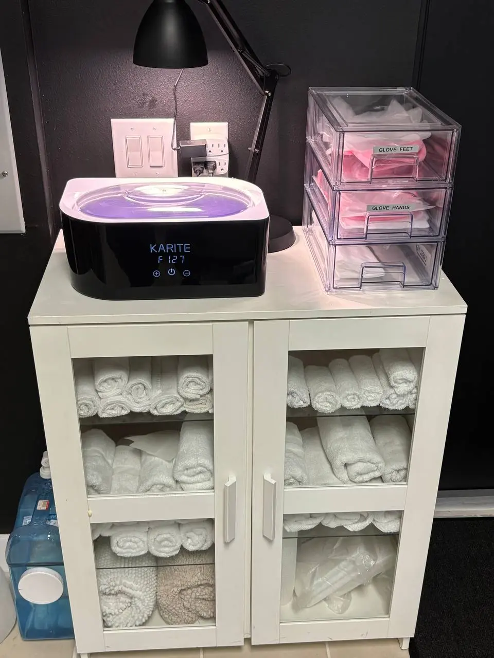 Pedicure station and spa amenities at NailLou Salon